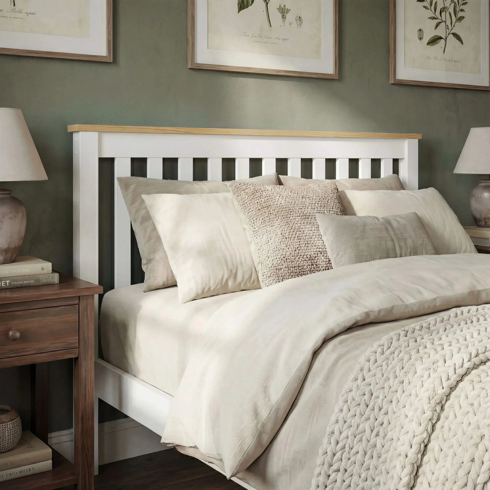 [Single | White + Pine] Neatly made bed with beige bedding and pillows in a room with framed artwork on the wall.