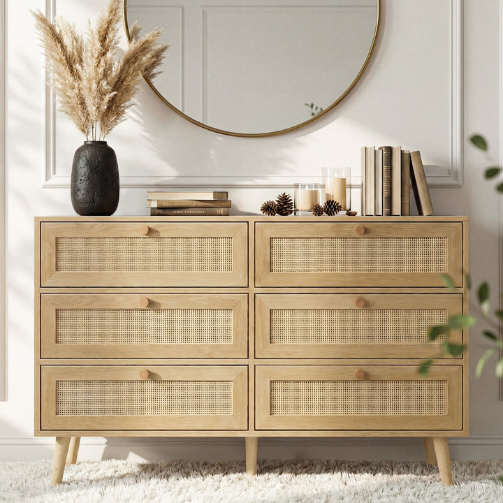 [Oak Effect] Wovena rattan wide 6 chest of drawers shown at angle showing six cane panels in two over four layout