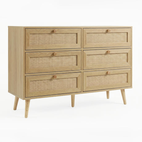 [Oak Effect] Wovena rattan wide 6 chest of drawers styled in panelled room with framed wall art behind