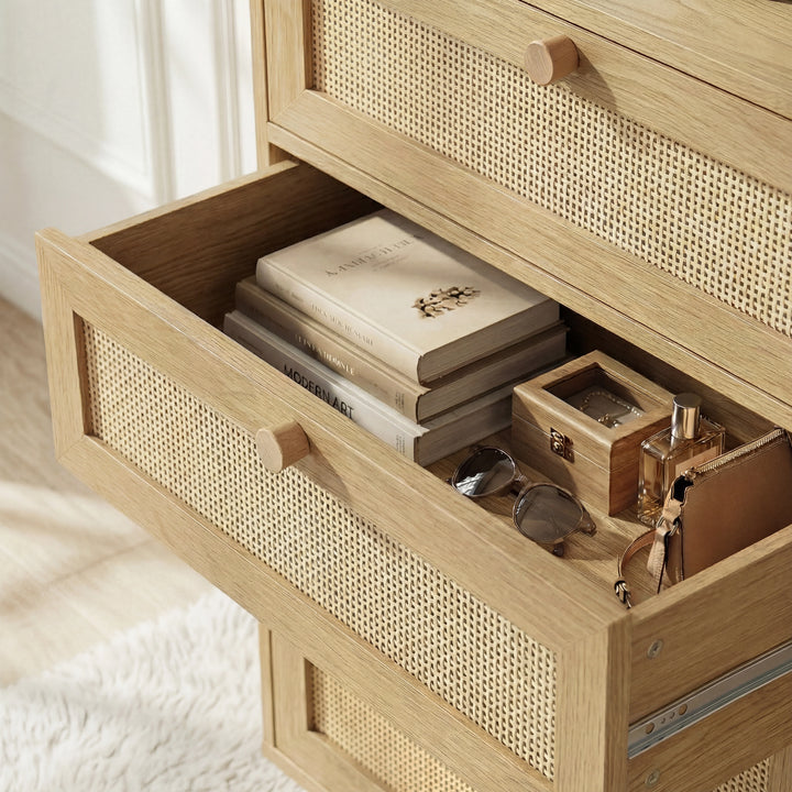 [Oak Effect] Top drawer Wovena rattan wide 6 chest of drawers pulled open showing folded knitwear and accessories
