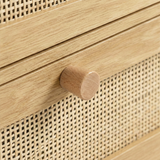 [Oak] Wovena rattan 2 door wardrobe detail: round pine knob on oak frame above cane mesh drawer