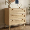 [Oak Effect] Wovena rattan chest of drawers at three-quarter angle in styled room with herringbone floor and wall art