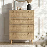 [Oak] Wovena chest styled front-facing against a white panelled wall with books, candles, and a dark vase on top