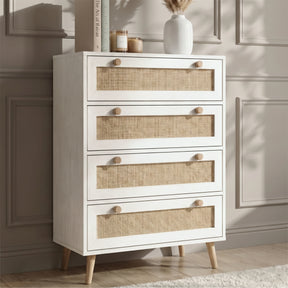 [White] Wovena rattan chest shown from the side, round knobs, tapered pine legs, white melamine body