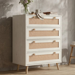 [White] Wovena rattan chest shown from the side, round knobs, tapered pine legs, white melamine body