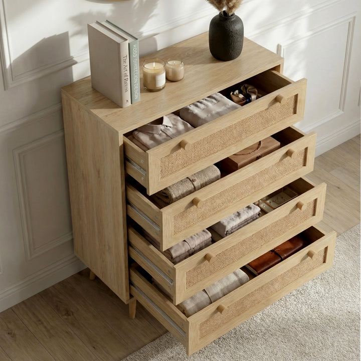 [Oak Effect] All four drawers open on Wovena rattan bedroom furniture set chest, candles and books on top