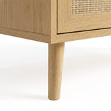 [Oak] Leg close-up showing mid-century tapered profile on oak five drawer chest