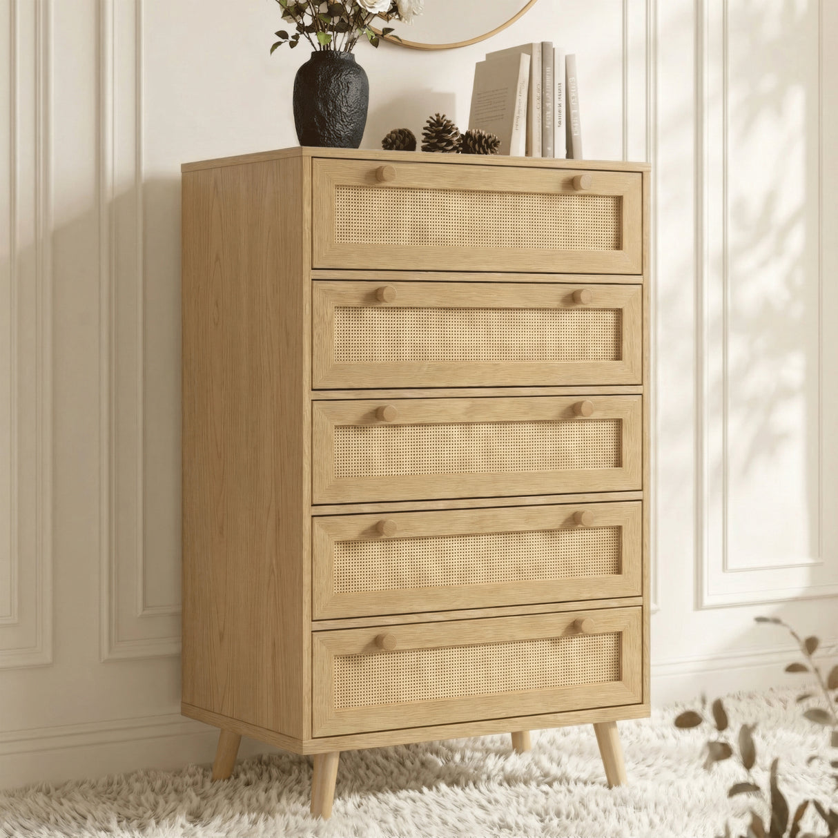 [Oak] tall 5 drawer unit from three-quarter angle with rattan panels and rug in panelled room