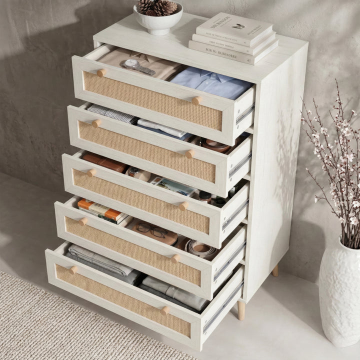 [White] Wovena rattan tallboy chest fully open from above, cane drawers staggered out exposing storage capacity