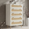 [White] Wovena rattan tallboy chest with five cane drawers angled view, ceramic bowl and round mirror styled on top