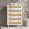 [White] Wovena 5 drawer rattan chest with cane fronts styled with round mirror, berry vase and books on top