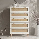[White] Wovena rattan tallboy chest front view with round wall mirror, berry vase and stacked books on top