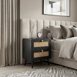 [Black] Wovena rattan bedside placed by upholstered bed and curtains, two cane drawers facing camera