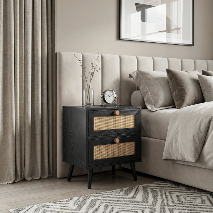 [Black] Wovena rattan bedside placed by upholstered bed and curtains, two cane drawers facing camera