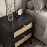 [Black] Wovena rattan bedside side angle next to grey sofa showing cane weave drawers and timber knobs