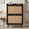 [Black] Wovena Rattan Black 2 Door Shoe Storage Cabinet front-facing in neutral hallway with black balustrade staircase and round black side table alongside