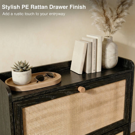 [Black] Wovena Rattan Black 2 Door Shoe Storage Cabinet top shelf showing PE rattan drawer finish detail with wooden tray, sunglasses, cream books, and marble pampas vase