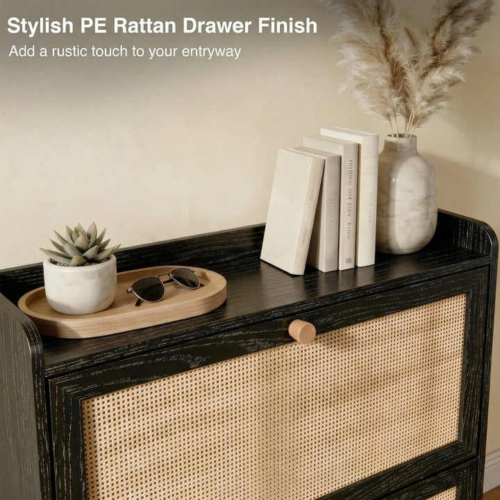 [Black] Wovena Rattan Black 2 Door Shoe Storage Cabinet top shelf showing PE rattan drawer finish detail with wooden tray, sunglasses, cream books, and marble pampas vase