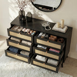 [Black] Wovena rattan chest with all six drawers pulled open showing folded clothes, belts and accessories inside