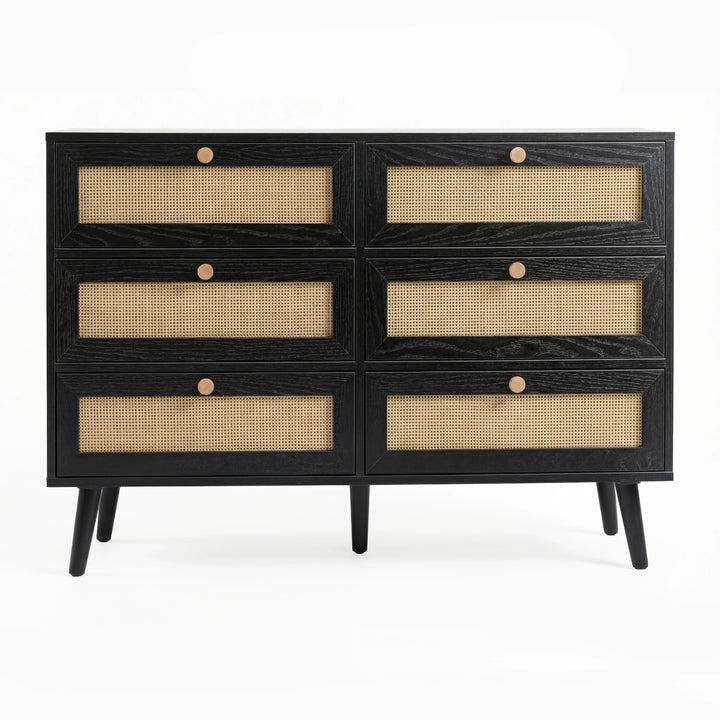 [Black] Wovena rattan chest cut-out front view on white background with six closed cane drawers and four dark legs