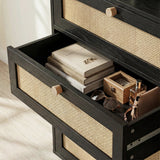 [Black] Wovena rattan chest open drawer interior shown with two books, wooden box and glasses on cane-front base