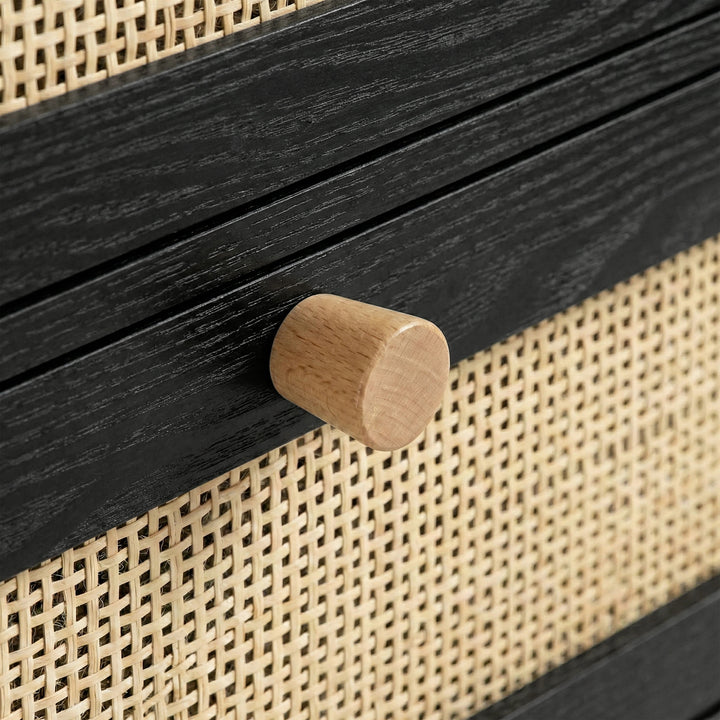 [Black] Wovena rattan chest wood knob close-up mounted on black frame with cane front beside
