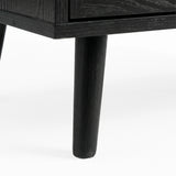 [Black] Wovena rattan chest tapered leg detail at base corner of the black painted frame
