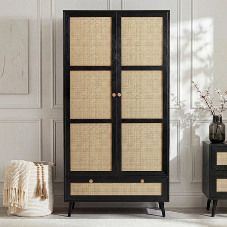 [Black] Wovena 2 door rattan wardrobe with cane mesh panels and bottom drawer styled beside matching chest of drawers