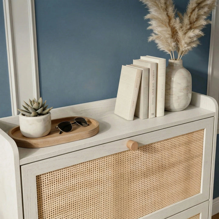 [White] Wovena Rattan White 2 Door Shoe Storage Cabinet top shelf styled with marble pampas vase, cream books, wooden tray with sunglasses and succulent in marble pot