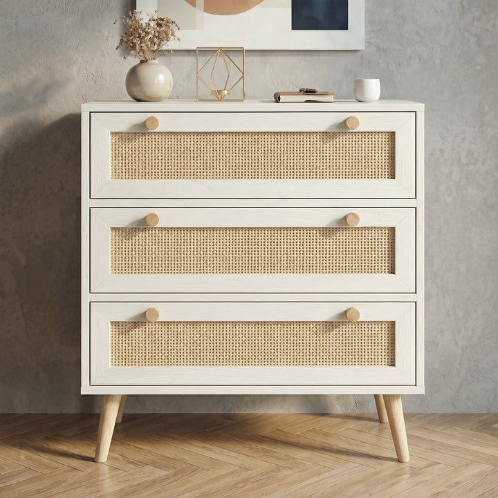 [White] Wovena White Rattan 3 Chest of Drawers, Pine legs straight-on view highlighting its natural woven panels.