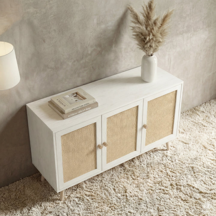 [White] Wovena Rattan 3 Door Sideboard - Adjustable Shelf White high-angle look showcasing its light wood-effect top surface.