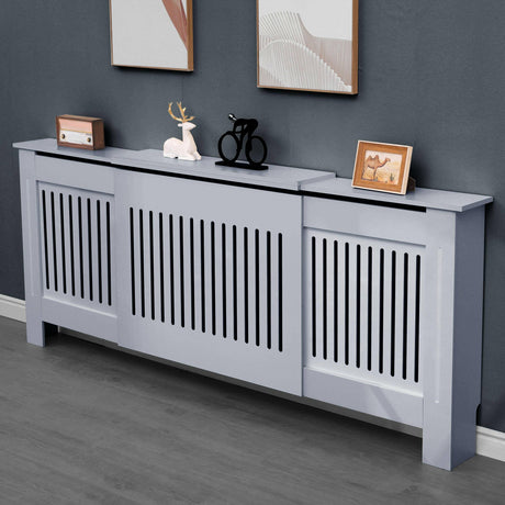 angled front view of grey adjustable radiator cover with side panels and spacious top in a cosy setting