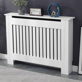 Stylish white radiator covers uk with vertical slats and a flat top shelf.