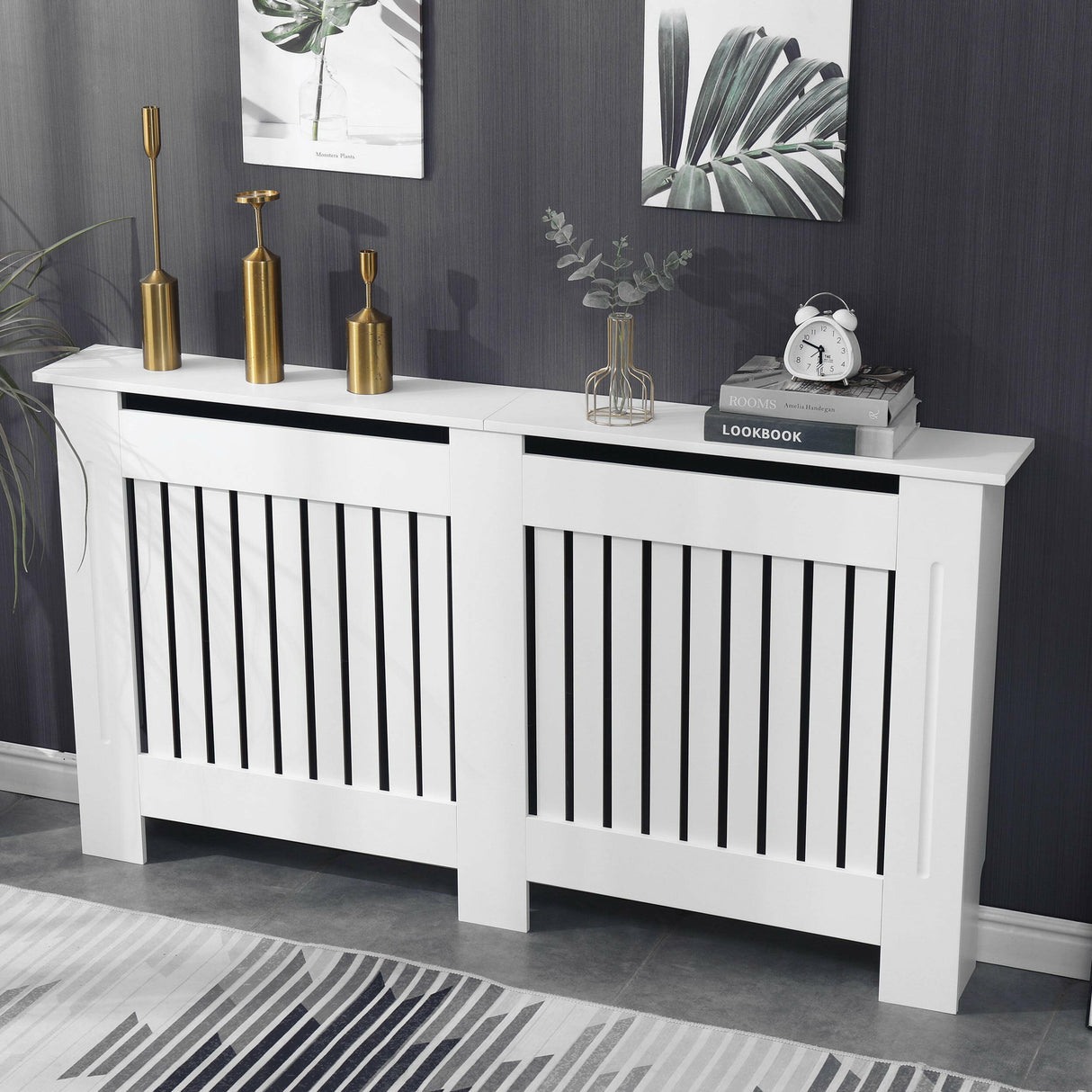 White radiator pipe covers white with vertical slats, styled in a modern living space.